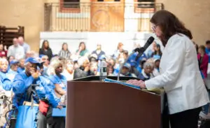 Mass Councils on Aging Executive Director Betsy Connell addresses the crowd.